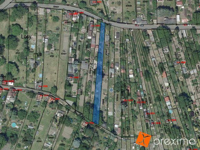 Prodej 1/6 pozemku 103 m2